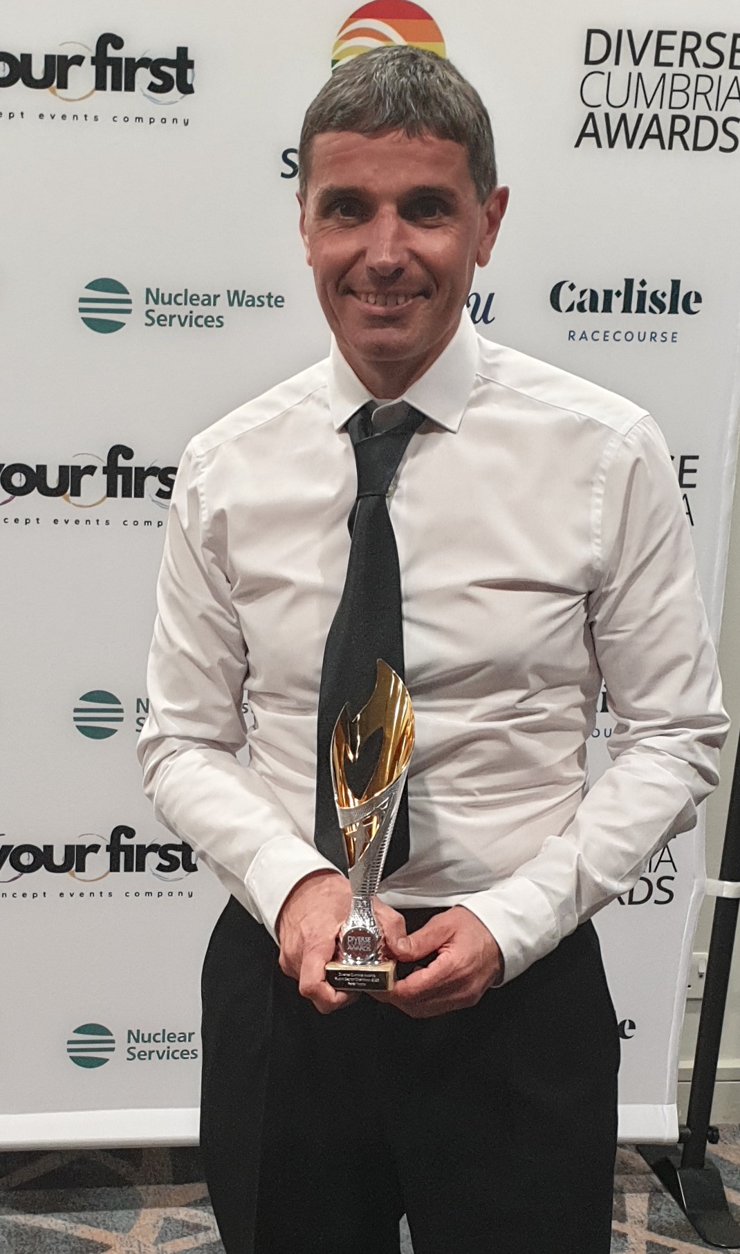 Pete Nichol with award