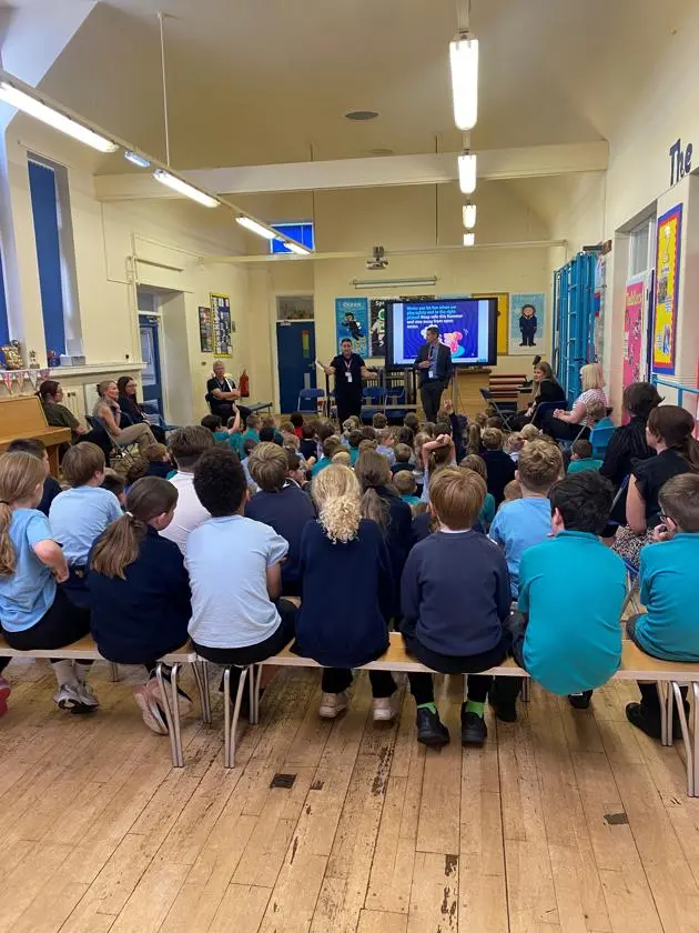 Pol-Ed programme: DCI Donnelly and Sgt Smyth lead an assembly at Warwick Bridge Primary School